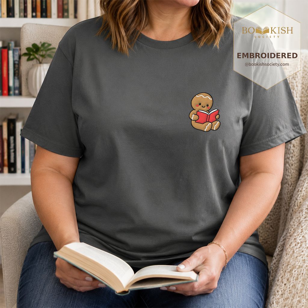 Gingerbread Character With Red Book Embroidered T-Shirt | Christmas Reader Gift Pepper