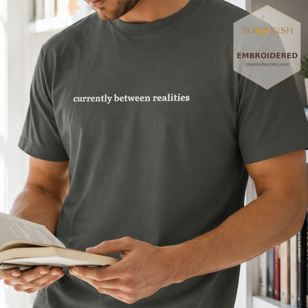Embroidered Currently Between Realities Comfort Color® T-shirt Book Lover Gift Pepper