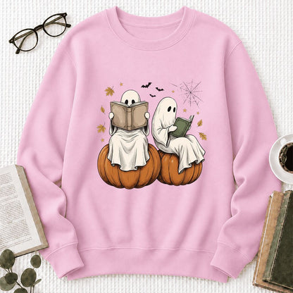 Small Ghosts Reading on Pumpkins Printed Sweatshirt | Spooky Book Lover Gift Light Pink