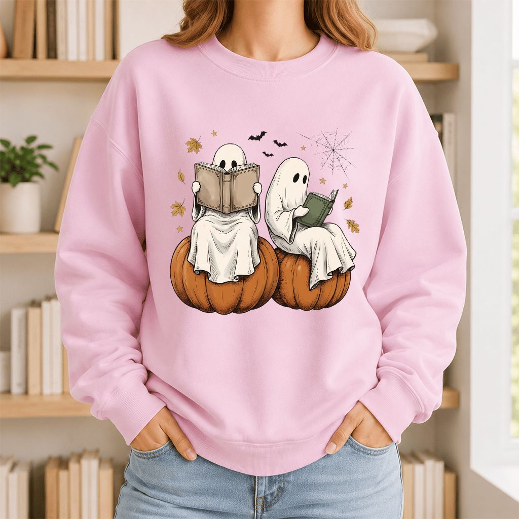 Small Ghosts Reading on Pumpkins Printed Sweatshirt | Spooky Book Lover Gift Light Pink