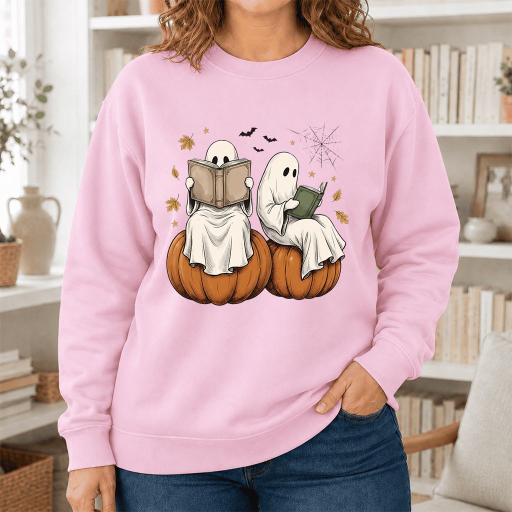Small Ghosts Reading on Pumpkins Printed Sweatshirt | Spooky Book Lover Gift Light Pink
