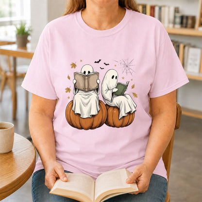 Small Ghosts Reading on Pumpkins Printed T-Shirt | Spooky Book Lover Gift Light Pink