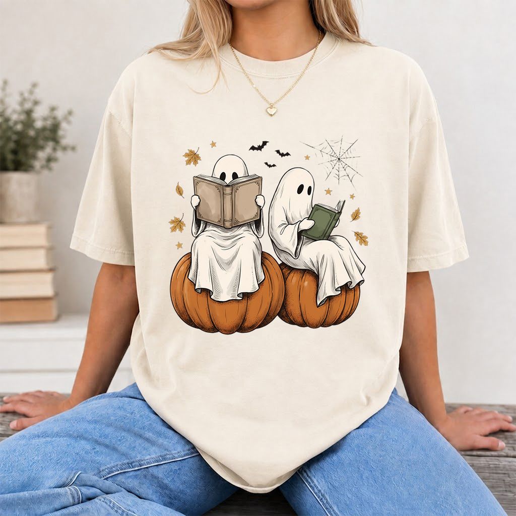 Small Ghosts Reading on Pumpkins Printed T-Shirt | Spooky Book Lover Gift Natural