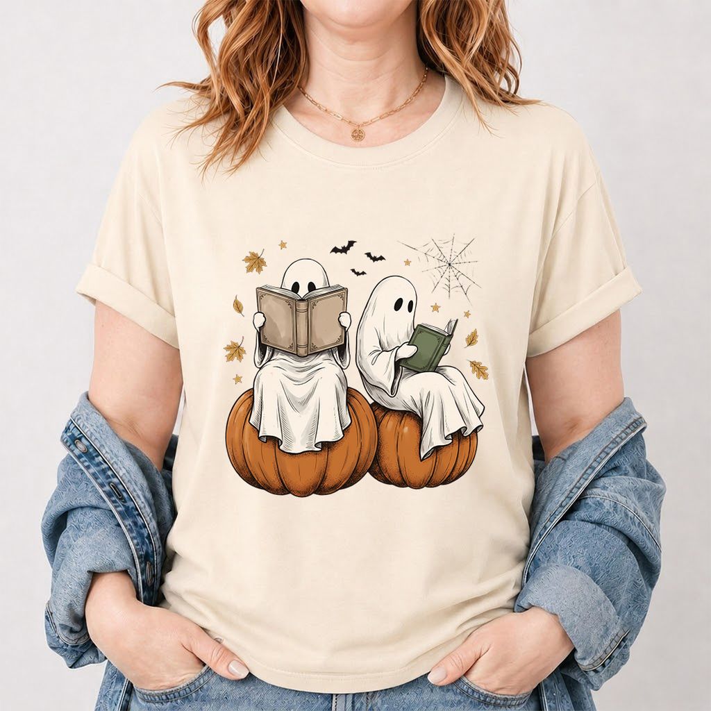 Small Ghosts Reading on Pumpkins Printed T-Shirt | Spooky Book Lover Gift Natural