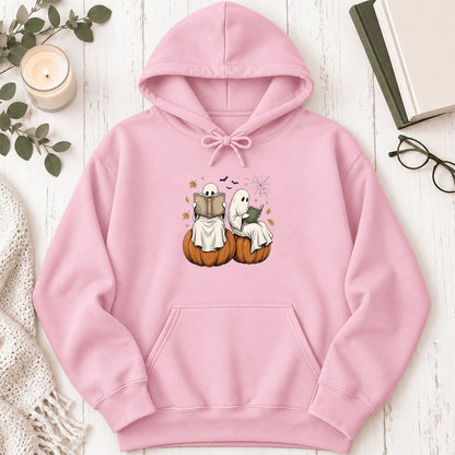 Small Ghosts Reading on Pumpkins Softstyle Hoodie | Spooky Book Lover Gift Light Pink