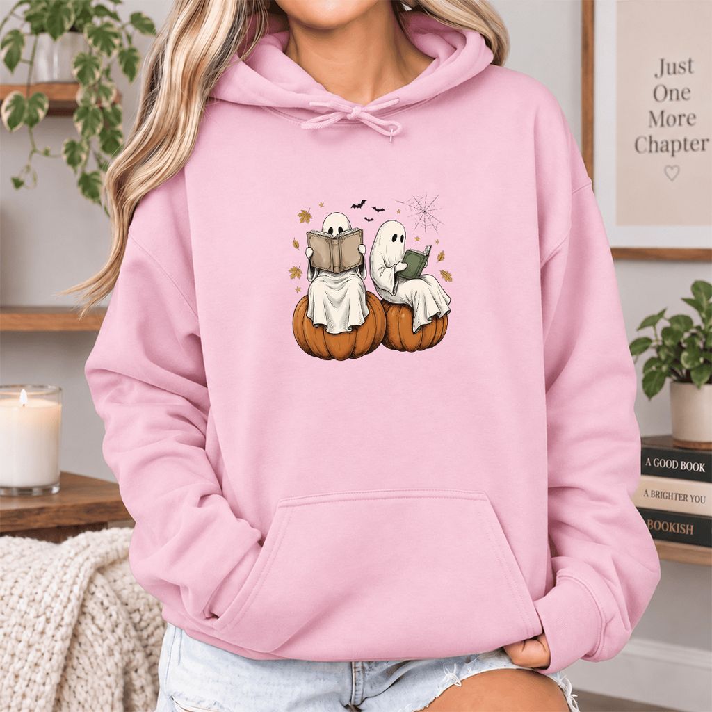 Small Ghosts Reading on Pumpkins Softstyle Hoodie | Spooky Book Lover Gift Light Pink