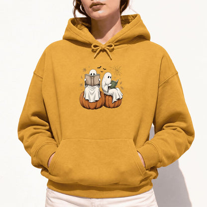 Small Ghosts Reading on Pumpkins Softstyle Hoodie | Spooky Book Lover Gift Mustard