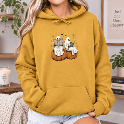 Small Ghosts Reading on Pumpkins Softstyle Hoodie | Spooky Book Lover Gift Mustard