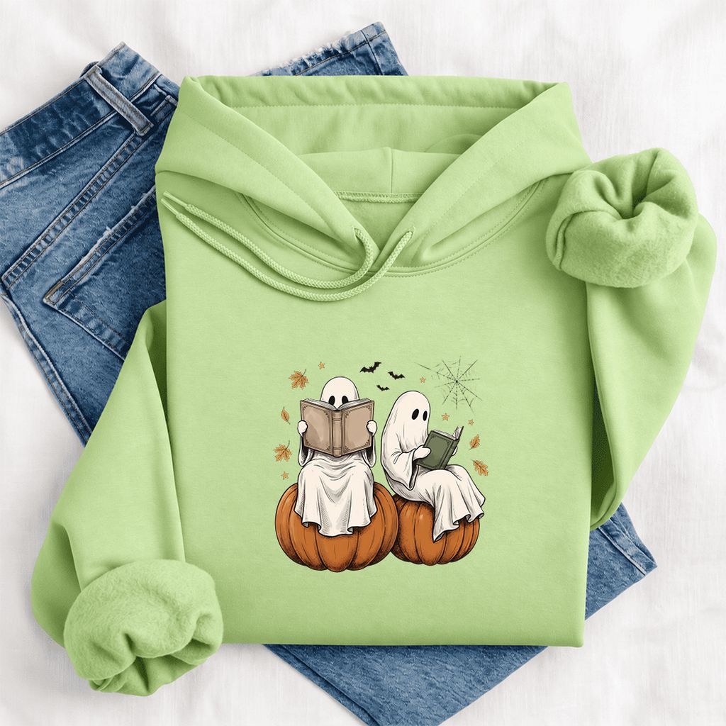Small Ghosts Reading on Pumpkins Softstyle Hoodie | Spooky Book Lover Gift Pistachio