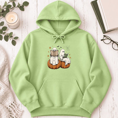 Small Ghosts Reading on Pumpkins Softstyle Hoodie | Spooky Book Lover Gift Pistachio