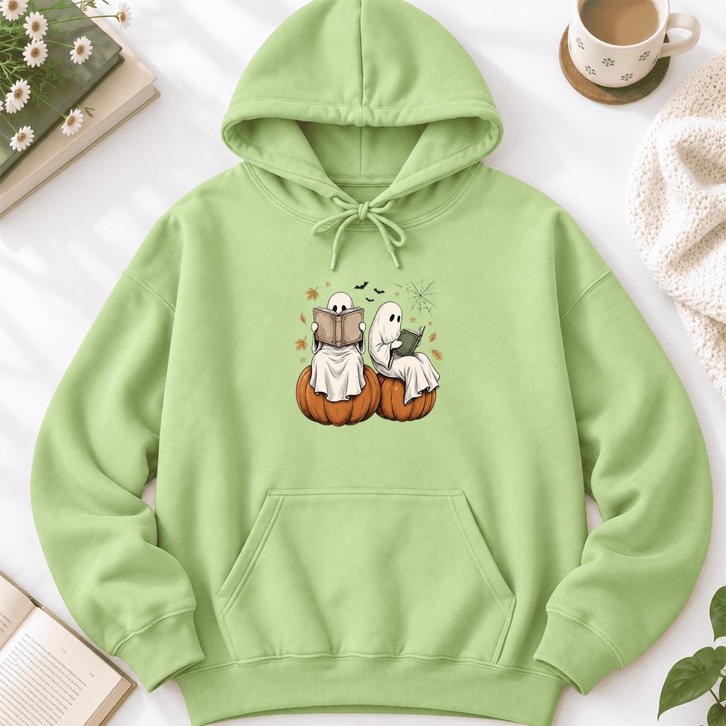 Small Ghosts Reading on Pumpkins Softstyle Hoodie | Spooky Book Lover Gift Pistachio