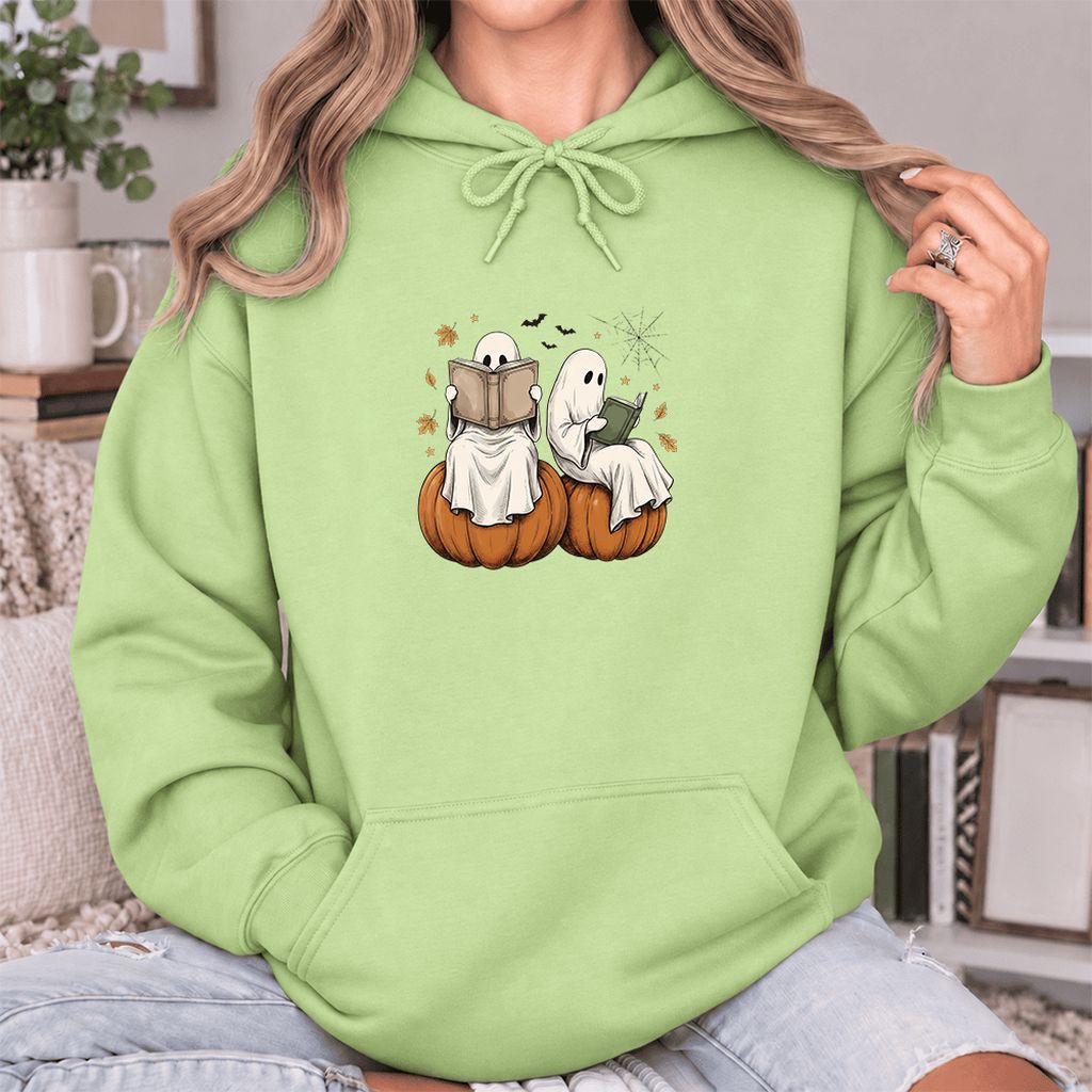 Small Ghosts Reading on Pumpkins Softstyle Hoodie | Spooky Book Lover Gift Pistachio