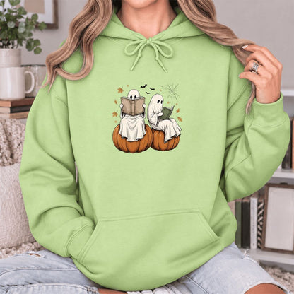 Small Ghosts Reading on Pumpkins Softstyle Hoodie | Spooky Book Lover Gift Pistachio