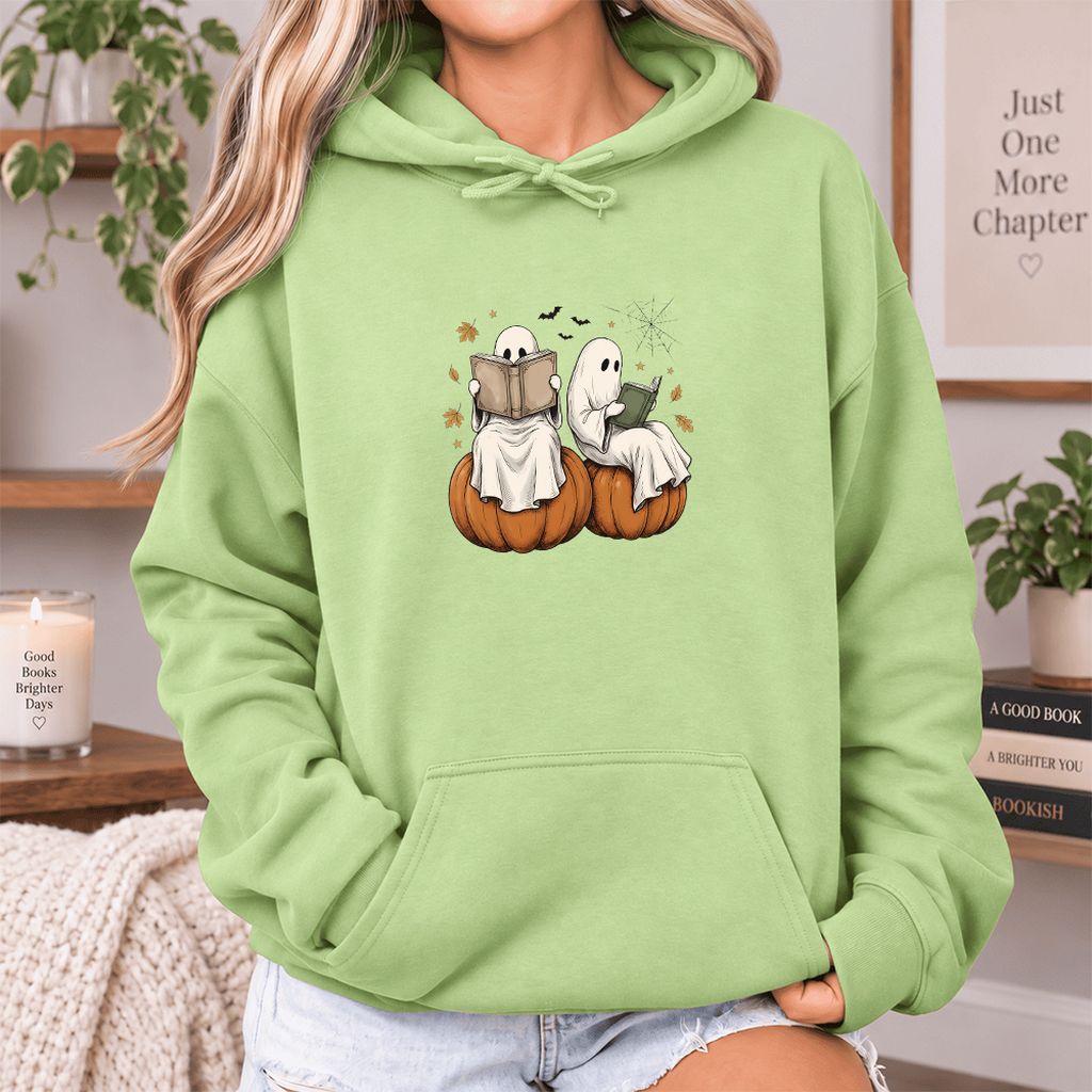 Small Ghosts Reading on Pumpkins Softstyle Hoodie | Spooky Book Lover Gift Pistachio