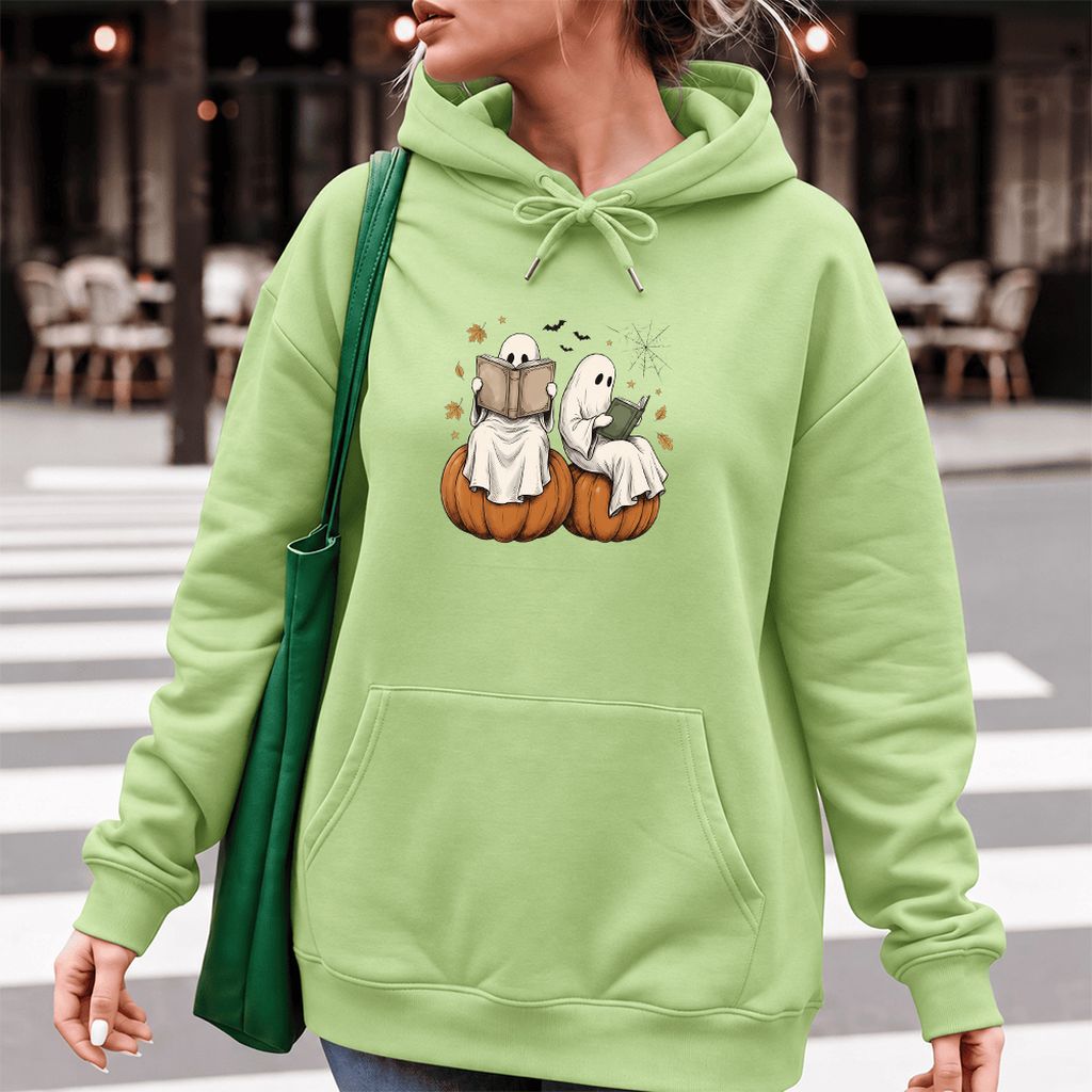 Small Ghosts Reading on Pumpkins Softstyle Hoodie | Spooky Book Lover Gift Pistachio