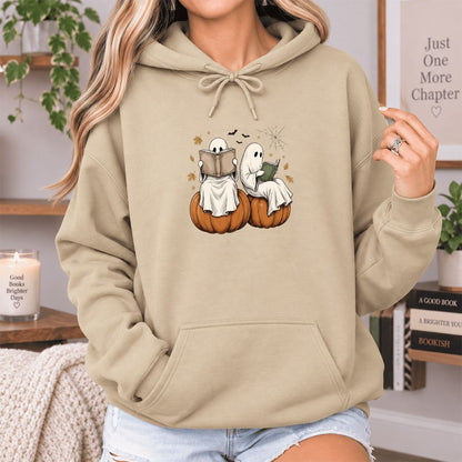 Small Ghosts Reading on Pumpkins Softstyle Hoodie | Spooky Book Lover Gift Sand