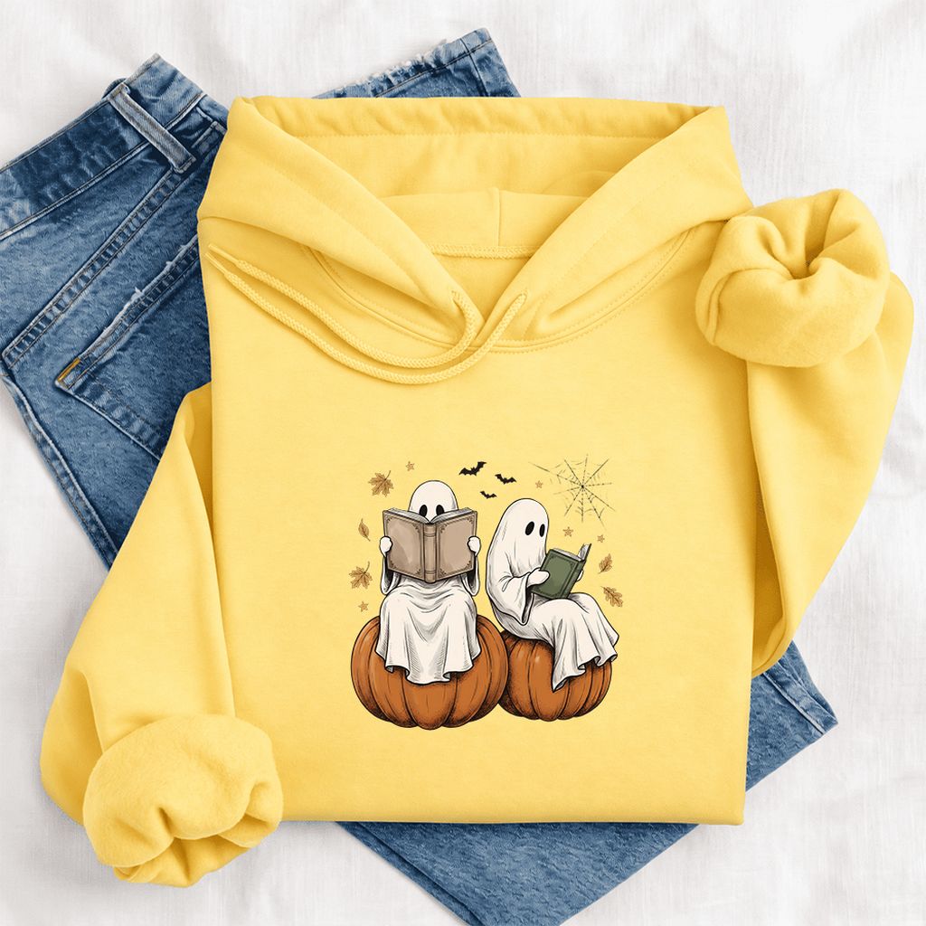 Small Ghosts Reading on Pumpkins Softstyle Hoodie | Spooky Book Lover Gift Yellow Haze