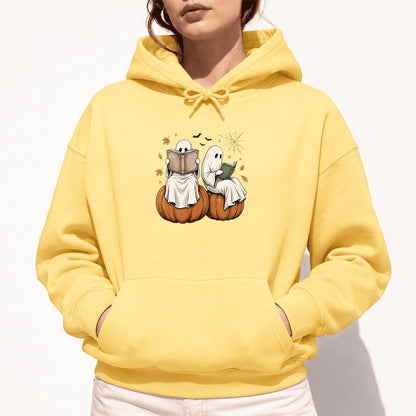 Small Ghosts Reading on Pumpkins Softstyle Hoodie | Spooky Book Lover Gift Yellow Haze