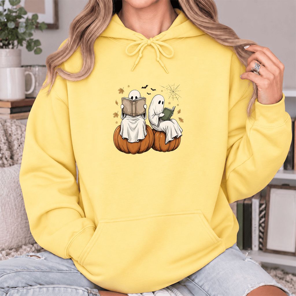 Small Ghosts Reading on Pumpkins Softstyle Hoodie | Spooky Book Lover Gift Yellow Haze