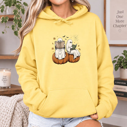Small Ghosts Reading on Pumpkins Softstyle Hoodie | Spooky Book Lover Gift Yellow Haze