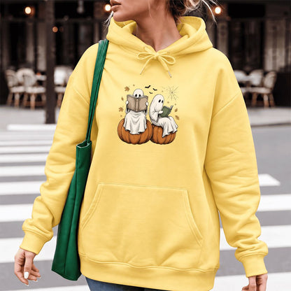 Small Ghosts Reading on Pumpkins Softstyle Hoodie | Spooky Book Lover Gift Yellow Haze