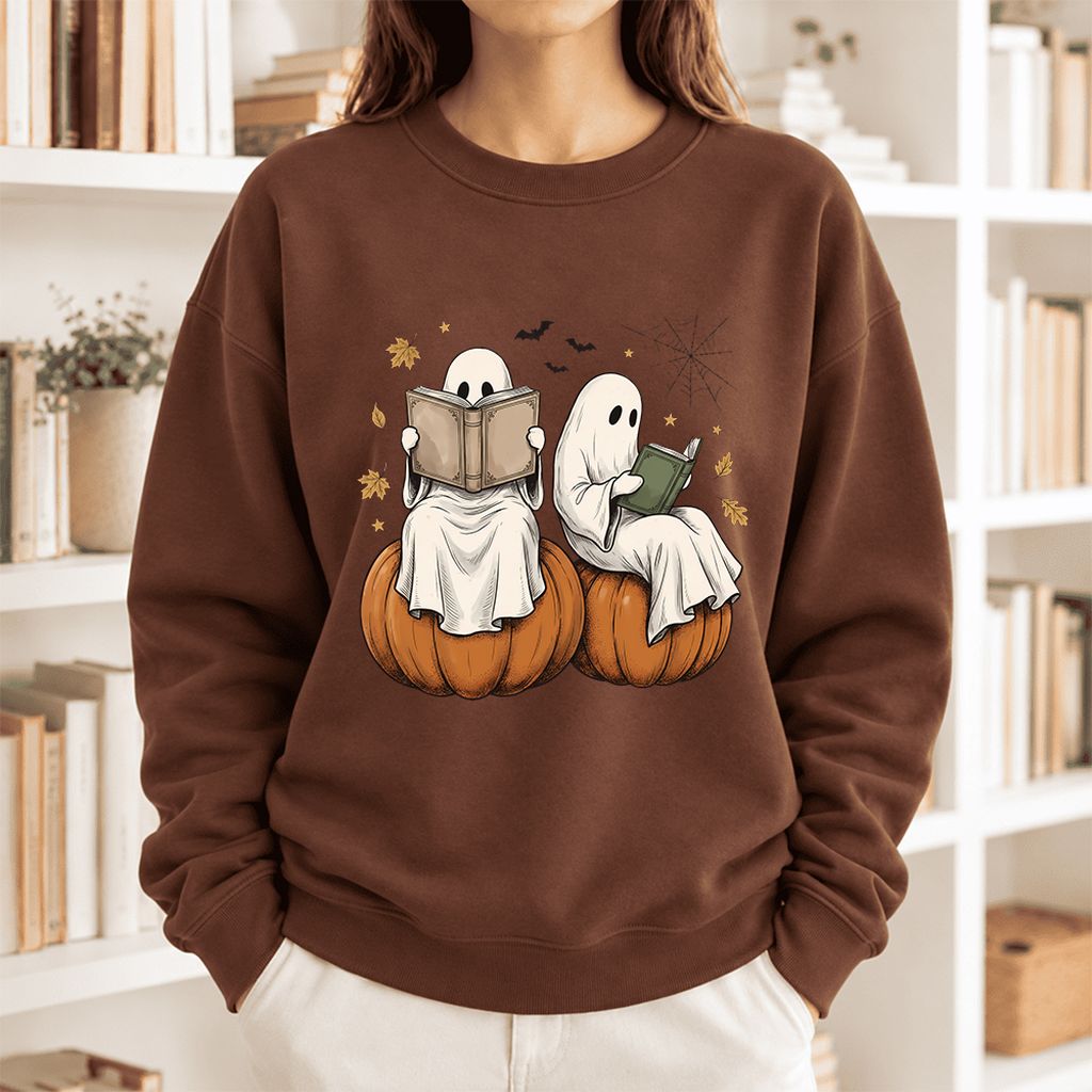Small Ghosts Reading on Pumpkins Softstyle Sweatshirt | Spooky Book Lover Gift Cocoa