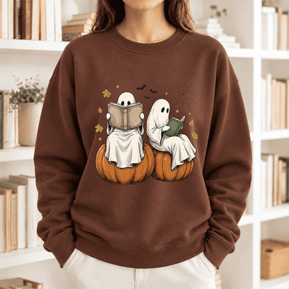 Small Ghosts Reading on Pumpkins Softstyle Sweatshirt | Spooky Book Lover Gift Cocoa