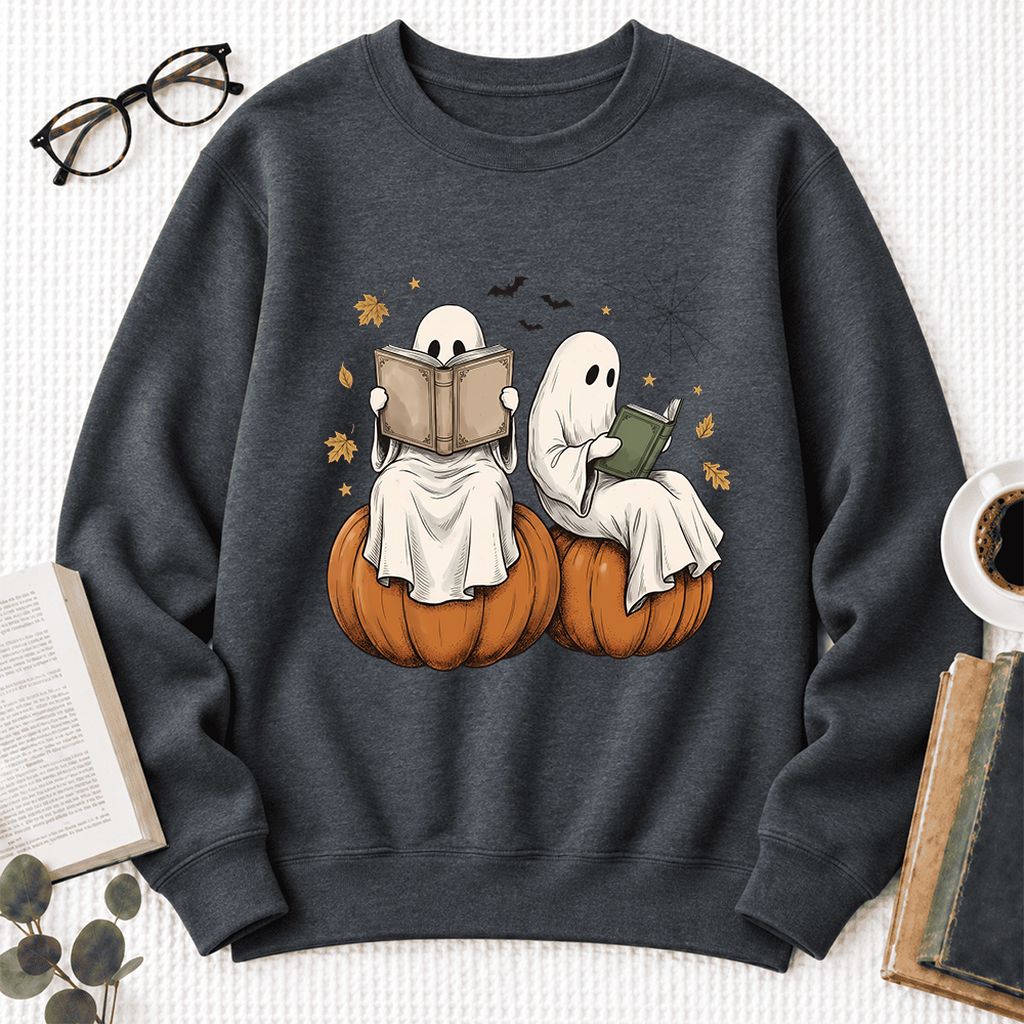 Small Ghosts Reading on Pumpkins Softstyle Sweatshirt | Spooky Book Lover Gift Dark Heather
