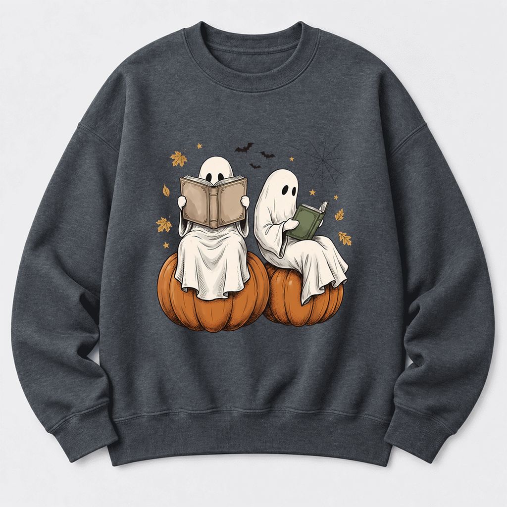 Small Ghosts Reading on Pumpkins Softstyle Sweatshirt | Spooky Book Lover Gift Dark Heather
