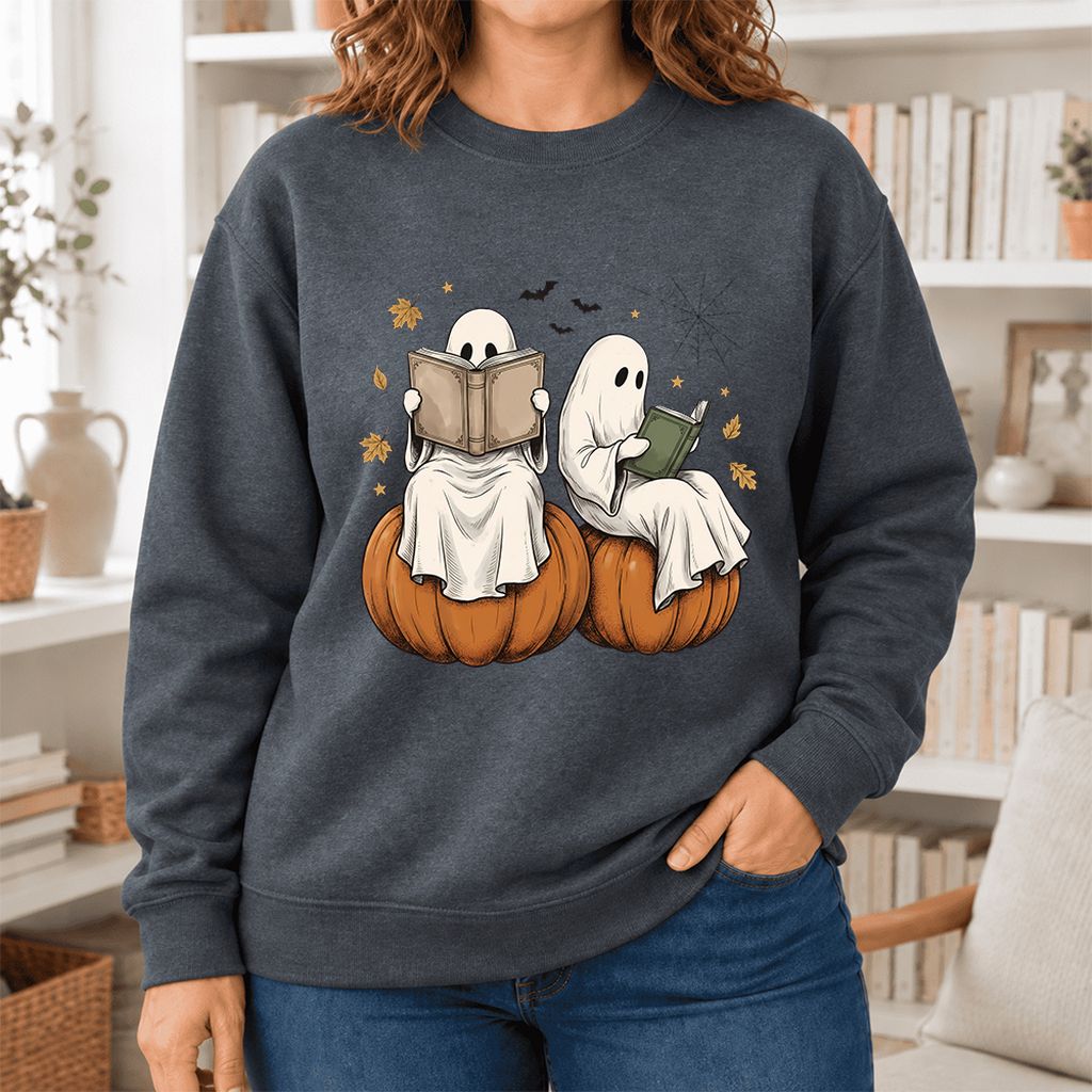 Small Ghosts Reading on Pumpkins Softstyle Sweatshirt | Spooky Book Lover Gift Dark Heather