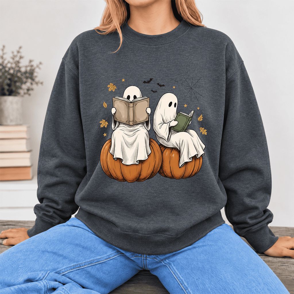 Small Ghosts Reading on Pumpkins Softstyle Sweatshirt | Spooky Book Lover Gift Dark Heather