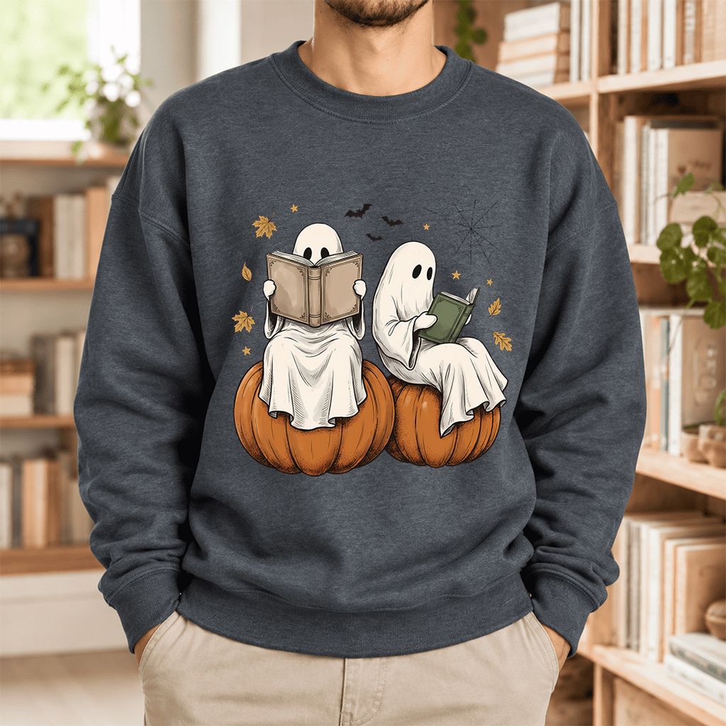 Small Ghosts Reading on Pumpkins Softstyle Sweatshirt | Spooky Book Lover Gift Dark Heather