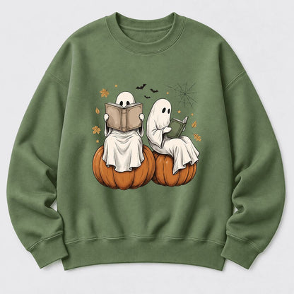Small Ghosts Reading on Pumpkins Softstyle Sweatshirt | Spooky Book Lover Gift Military Green