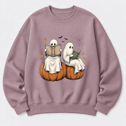 Small Ghosts Reading on Pumpkins Softstyle Sweatshirt | Spooky Book Lover Gift Paragon