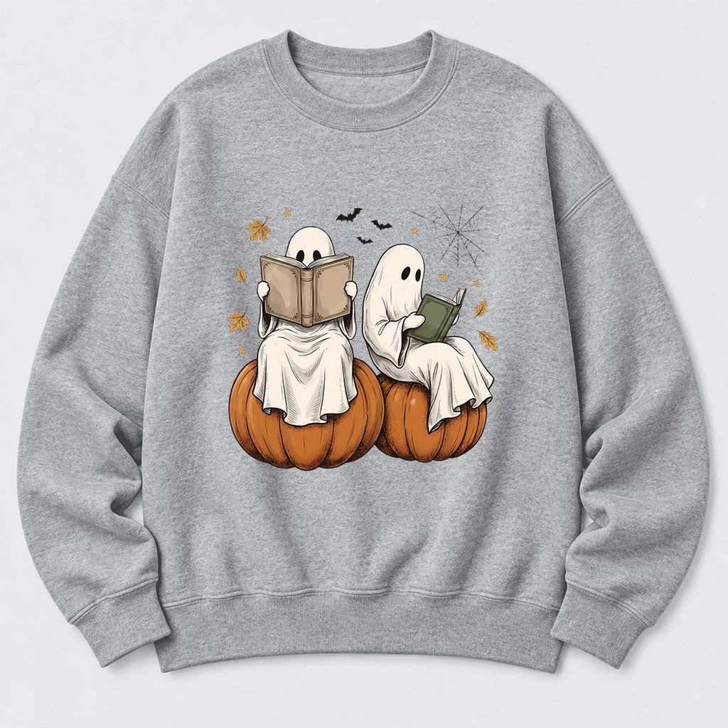 Small Ghosts Reading on Pumpkins Softstyle Sweatshirt | Spooky Book Lover Gift Sport Grey