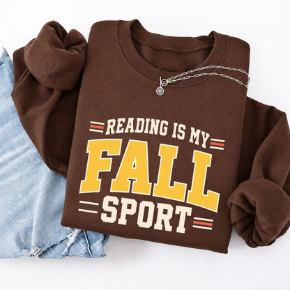 Reading Is My Fall Sport Softstyle Sweatshirt | Funny Book Lover Gift Cocoa
