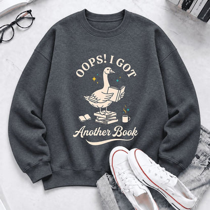 Oops! I Got Another Book Softstyle Sweatshirt | Playful Book Lover Gift Dark Heather