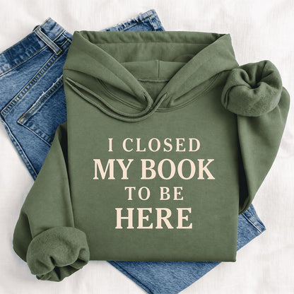 I Closed My Book To Be Here Softstyle Hoodie | Funny Book Lover Gift Military Green