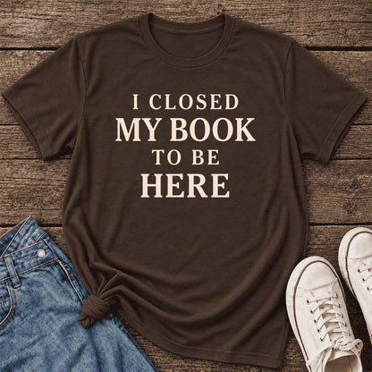 I Closed My Book To Be Here Ultra-Soft Cotton T-Shirt | Funny Book Lover Gift Brown