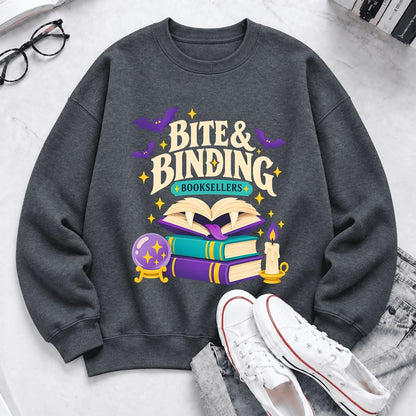 Bite & Binding Booksellers Softstyle Sweatshirt | Fantasy Reader Gift Dark Heather