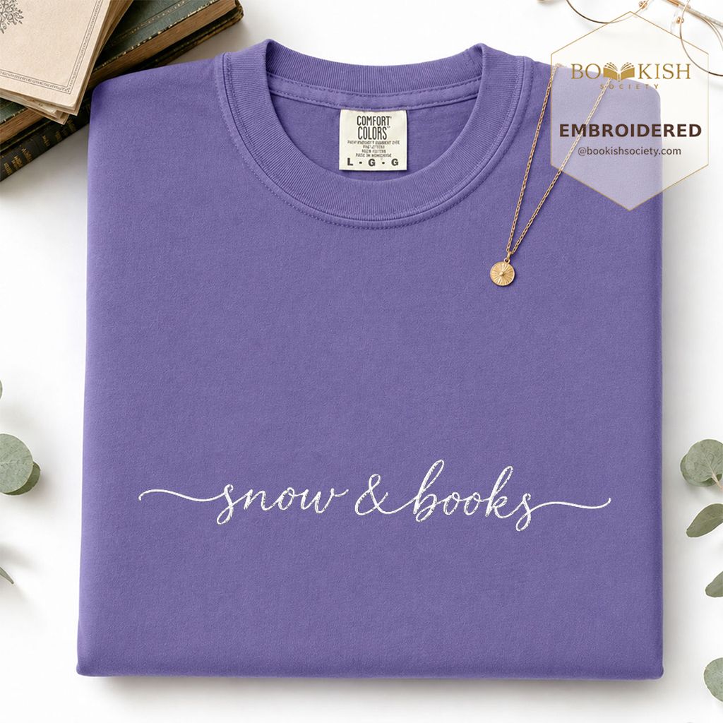 Snow & Books Embroidered T-Shirt | Evergreen Reader Gift Grape