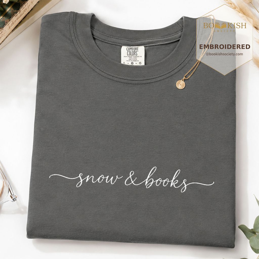 Snow & Books Embroidered T-Shirt | Evergreen Reader Gift Pepper