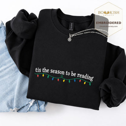 Tis The Season To Be Reading Embroidered Sweatshirt | Christmas Reader Gift Black