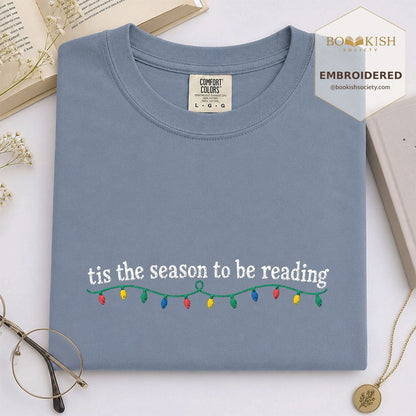 Tis The Season To Be Reading Embroidered T-Shirt | Christmas Reader Gift Blue Jean