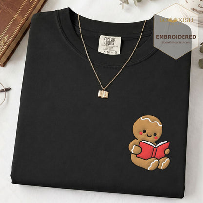 Gingerbread Character With Red Book Embroidered T-Shirt | Christmas Reader Gift Black