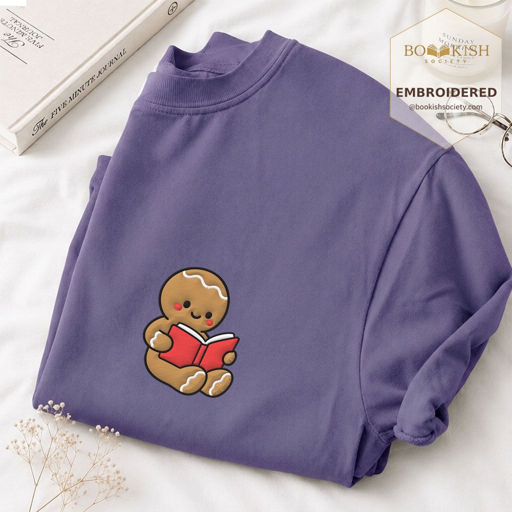 Gingerbread Character With Red Book Embroidered T-Shirt | Christmas Reader Gift Grape
