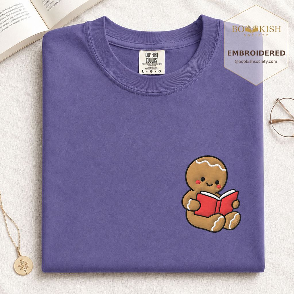 Gingerbread Character With Red Book Embroidered T-Shirt | Christmas Reader Gift Grape
