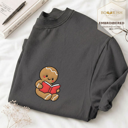 Gingerbread Character With Red Book Embroidered T-Shirt | Christmas Reader Gift Graphite