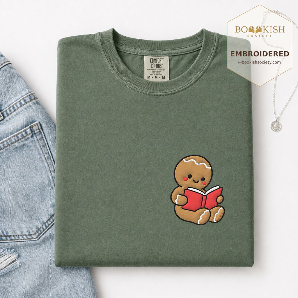 Gingerbread Character With Red Book Embroidered T-Shirt | Christmas Reader Gift Moss