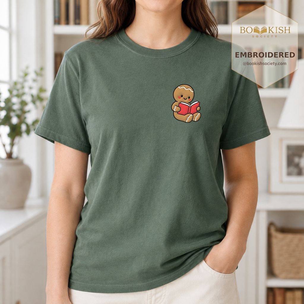 Gingerbread Character With Red Book Embroidered T-Shirt | Christmas Reader Gift Moss